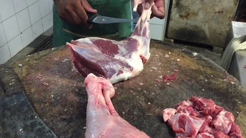 Butcher cutting lamb meat Stock Footage 119473740