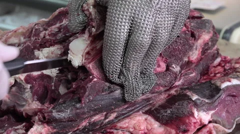 A butcher cutting meat cubes Video stock 55752975