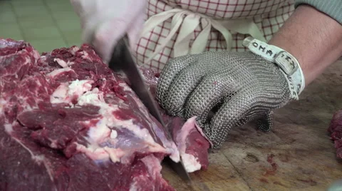 A butcher cutting meat cubes Video stock 55756159