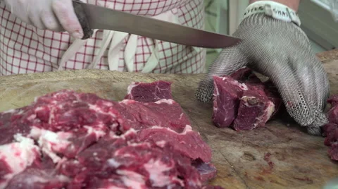 A butcher cutting meat cubes Video stock 55757651