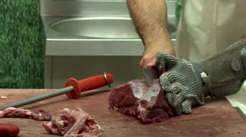 Butcher cutting meat Stock Footage 48802593