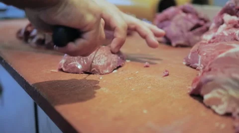 Butcher Cutting Meat into Small Cubes 스톡 동영상 41506792