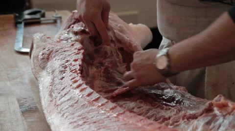 Butcher cutting pork 3 Stock Footage 42230089