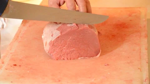 Butcher cutting steaks Stock Footage 42889912