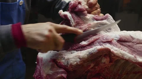 Butcher Hands Moving And Cutting Big Chunk Of Pork Meat With Sharp Knife Stock Footage 43248698