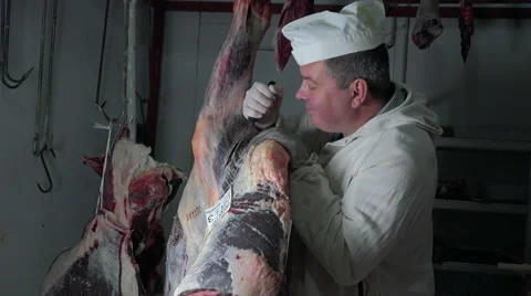 Butcher in his cold room Stock-Footage 55776384