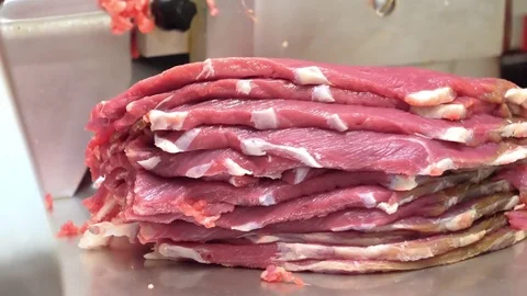 Butcher prepares beef slices Stock-Footage 85306278