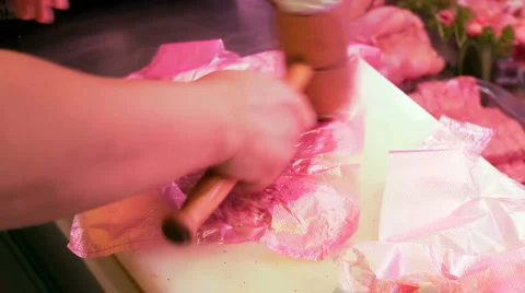 Butcher processed the meat with a hammer and prepares it for the grill Stock Footage