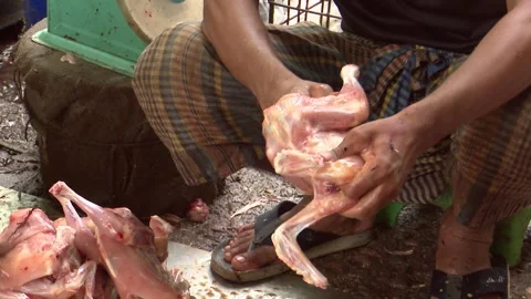 Butcher processing fresh meat at local market Stock Footage 320034073
