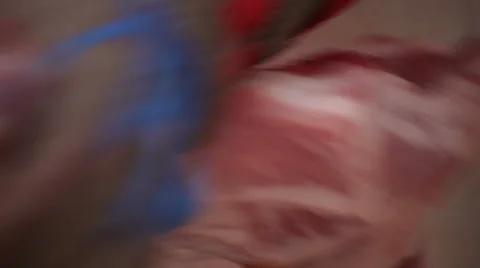 Butcher removing pig bone off ham Stock Footage 41460169