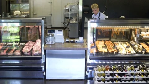 Butcher standing behind counter Stock-Footage 83455793