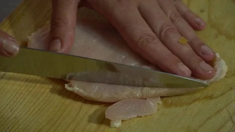 Butchering a chicken Stock Footage 85339775