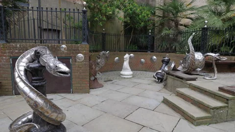Butler's Gap Conga Eel and metal sculptures in George Street Hastings Stock Footage 276309974