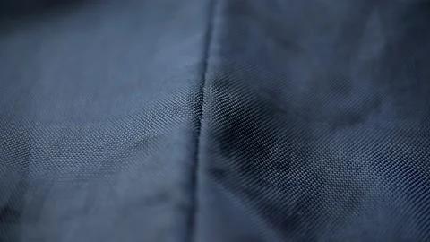 Butt Raincoat Cloth Slider Shot Stock Footage 234437400