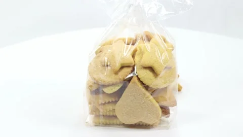 Butter baked biscuits in the shape of a star and heart Stock Footage 140669093