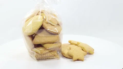 Butter baked biscuits in the shape of a star and heart Stock Footage 140669097