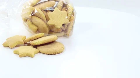Butter baked biscuits in the shape of a star and heart Stock Footage 140669133
