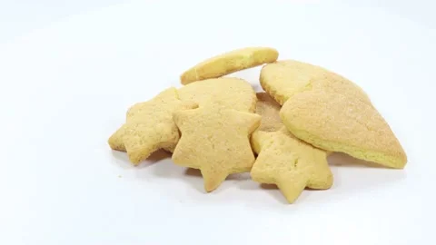 Butter baked biscuits in the shape of a star and heart Stock Footage 140669298