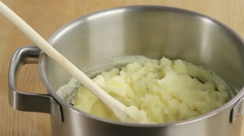 Butter being added to mashed potatoes Stock Footage 24666212