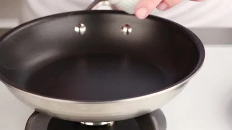 Butter being melted in a pan Stock Footage 24670052