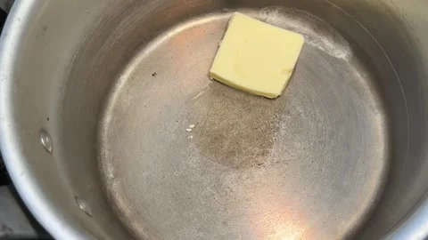 Butter Block Melting into Liquid in a Hot Pot, Japanese Izakaya Kitchen Stock Footage 344607747