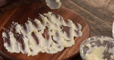 Butter board preparing close up Stock Footage 302381742