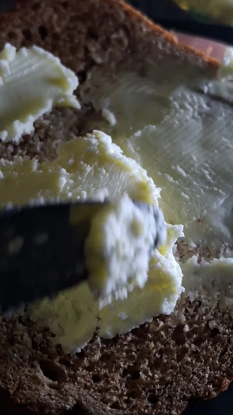 Butter on bread Stock Footage 341690586