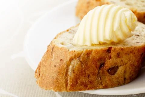 Butter on a bread Stock Photos