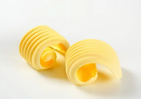 Butter curls on a clean surface Stock Photos