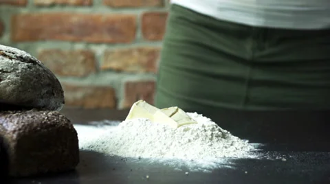 Butter dropping into flour, slow motion at 60 fps Stock Footage 31704191