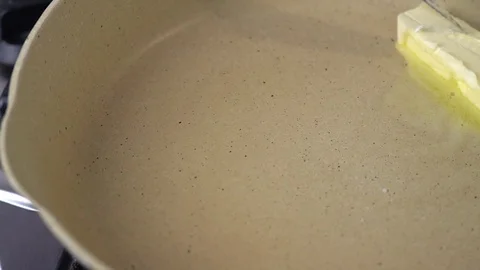 Butter melting Stock Footage 128635245