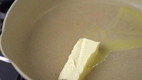 Butter melting Stock Footage 128636074