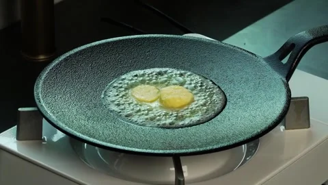 The butter melting in the pan Stock Footage 334358092