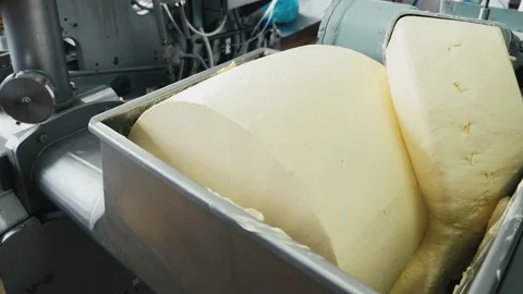Butter is pouring from the pipe Stock Footage 78458496
