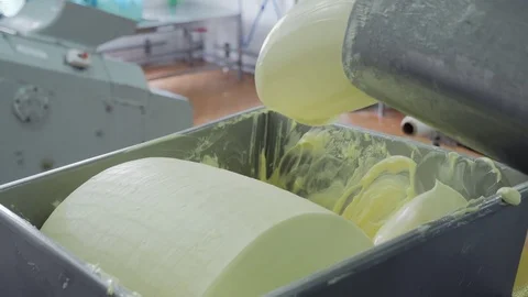 Butter is pouring from the pipe Stock Footage 80220284