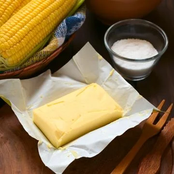 Butter with Salt and Cooked Sweet Corn Stock Photos