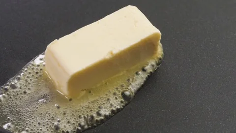 Butter Sizzling on the pan Stock Footage 85075400