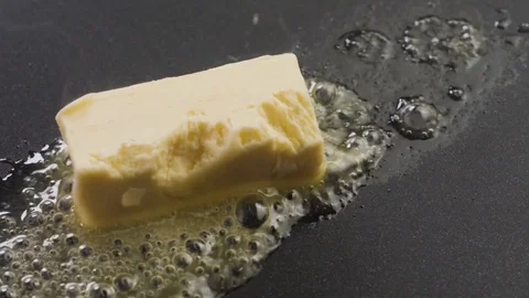 Butter Sizzling on the pan Stock Footage 85075456