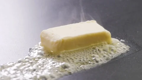 Butter Sizzling on the pan Stock Footage 85075500