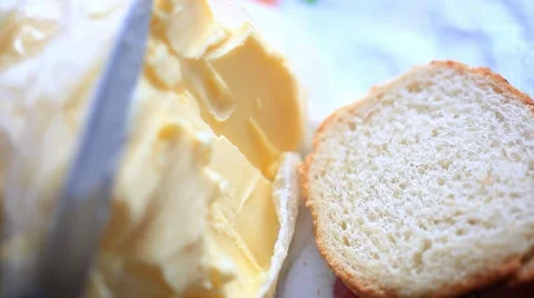 Butter smears  on Slices of Wheat Bread , closeup. HD. 1920x1080 Stock Footage 47995700