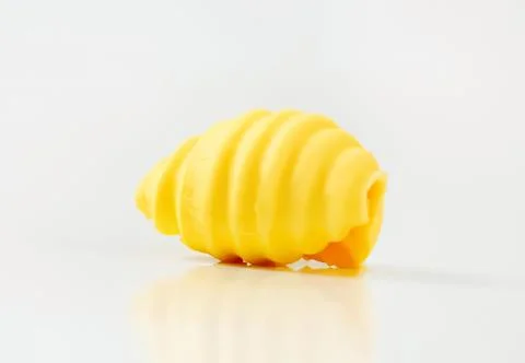 Butter spread on bread with spiral pattern Stockfoto's