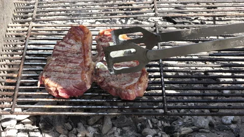 Butter on a steak 4K Stock Footage 130805810