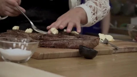 Butter on steaks Stock Footage 79507415