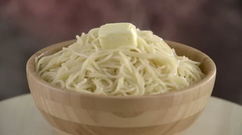 Butter Thaws on Hot Spaghetti From Which There is Steam Video stock 61153153