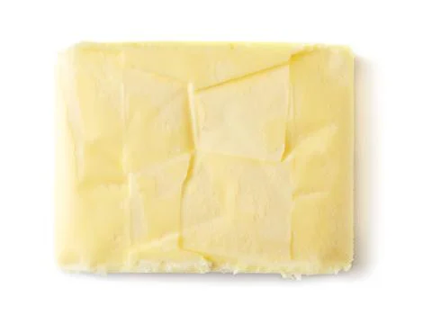 Butter on white background Stock Photos