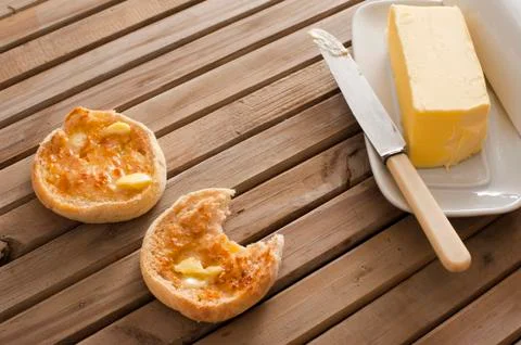Buttered crumpets for breakfast Stock Photos