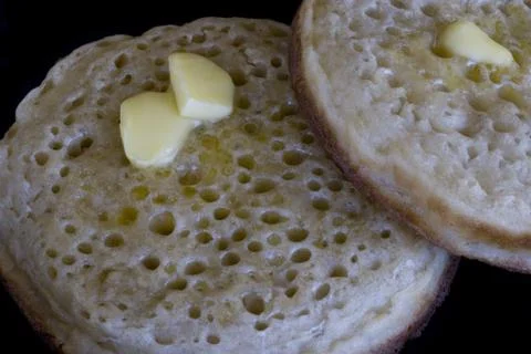Buttered crumpets Stock Photos