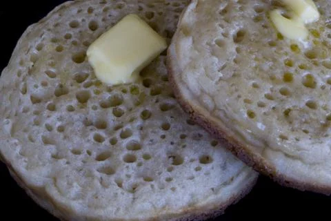 Buttered crumpets Stock Photos