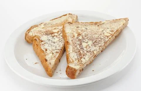 Buttered toast triangles Stock Photos