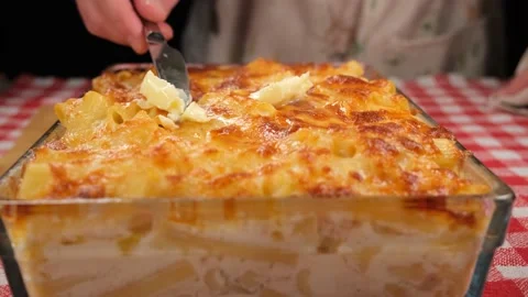 Buttering on baked pasta Stock Footage 237478285